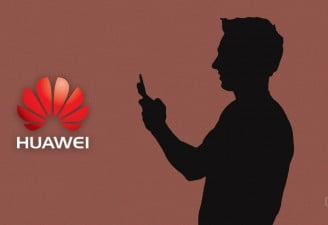 Huawei logo with a person using phone