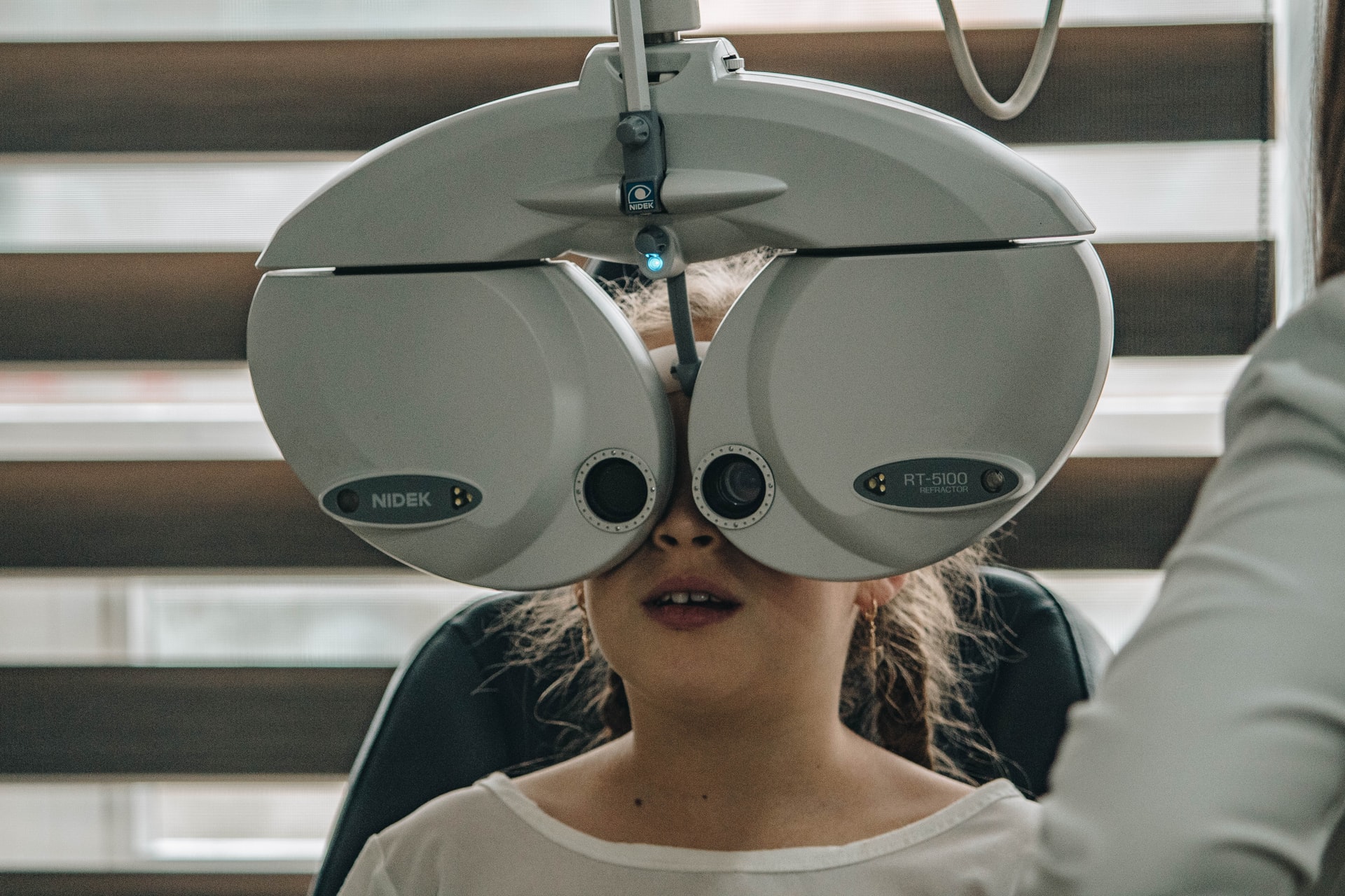 A Girl Getting An Eye Checkup