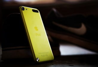 A photo from back of yellow iPod touch