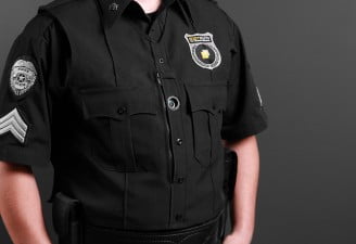 A photo of Police uniform with body camera