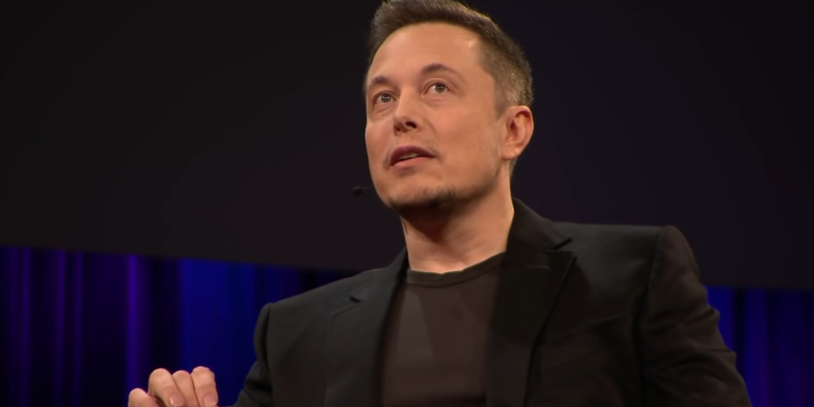 A picture of Elon Musk from a TED talk