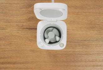 An aerial view of earbuds washer